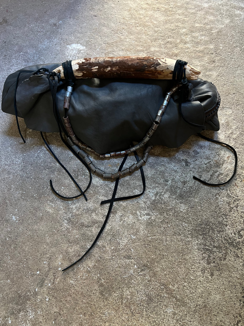 CARVED WOOD HANDLE LEATHER BAG