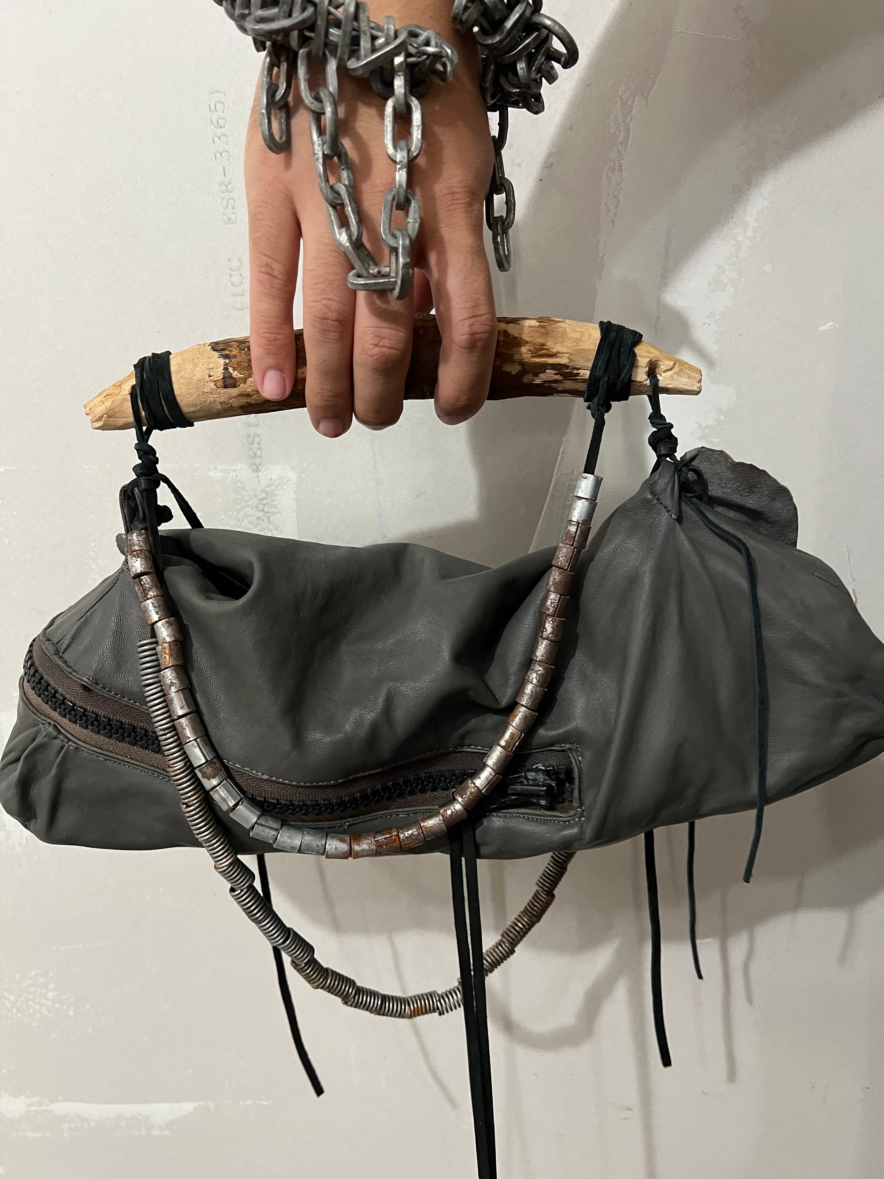 CARVED WOOD HANDLE LEATHER BAG