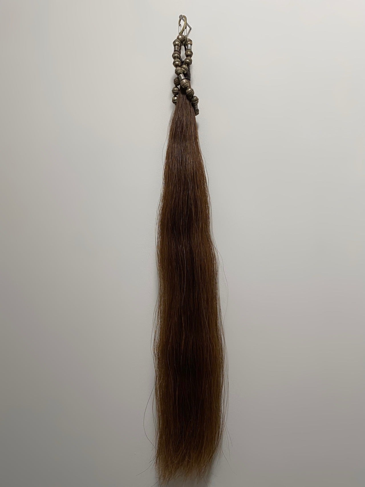 BROWN HORSE TAIL ADORNMENT