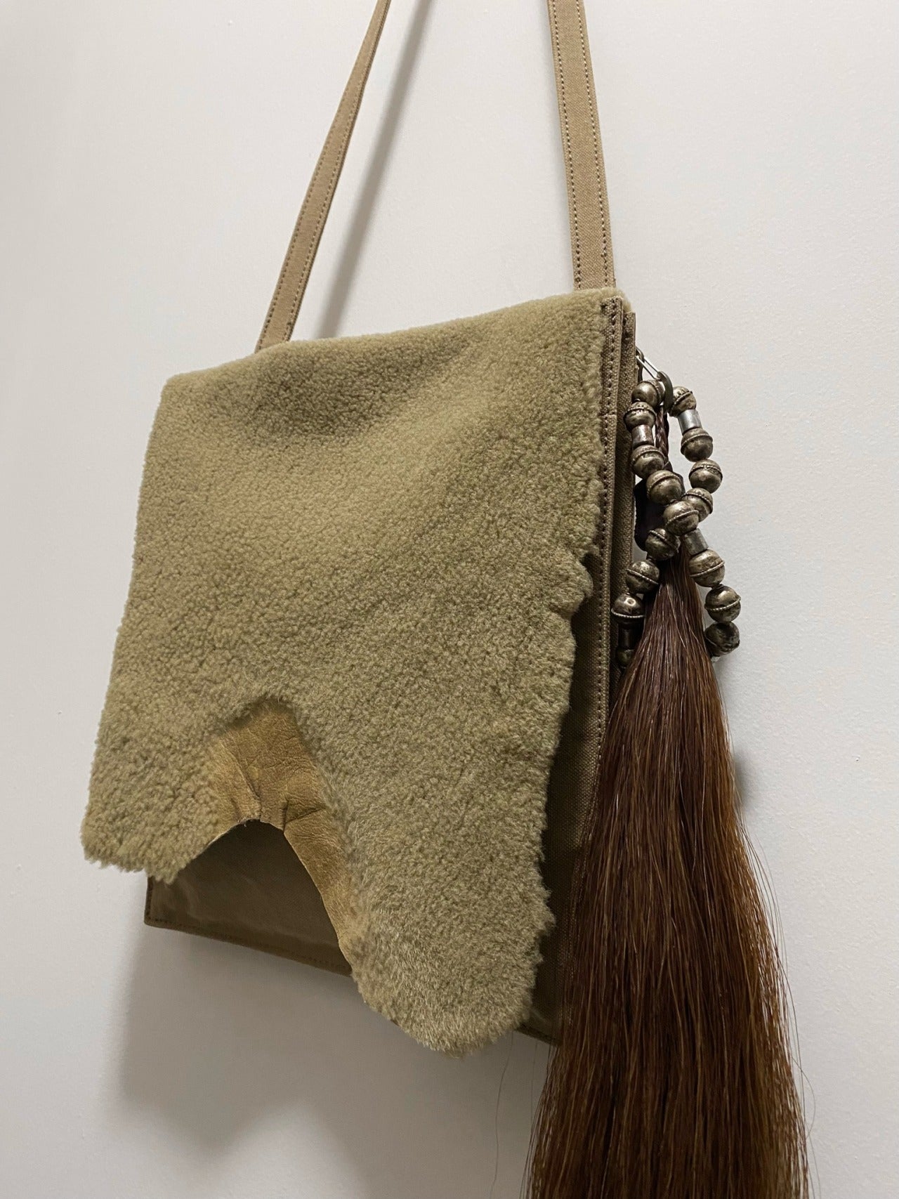 BROWN HORSE TAIL ADORNMENT