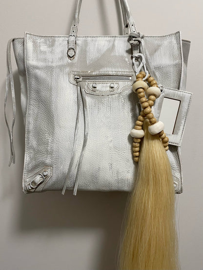 BLOND HORSE TAIL ADORNMENT