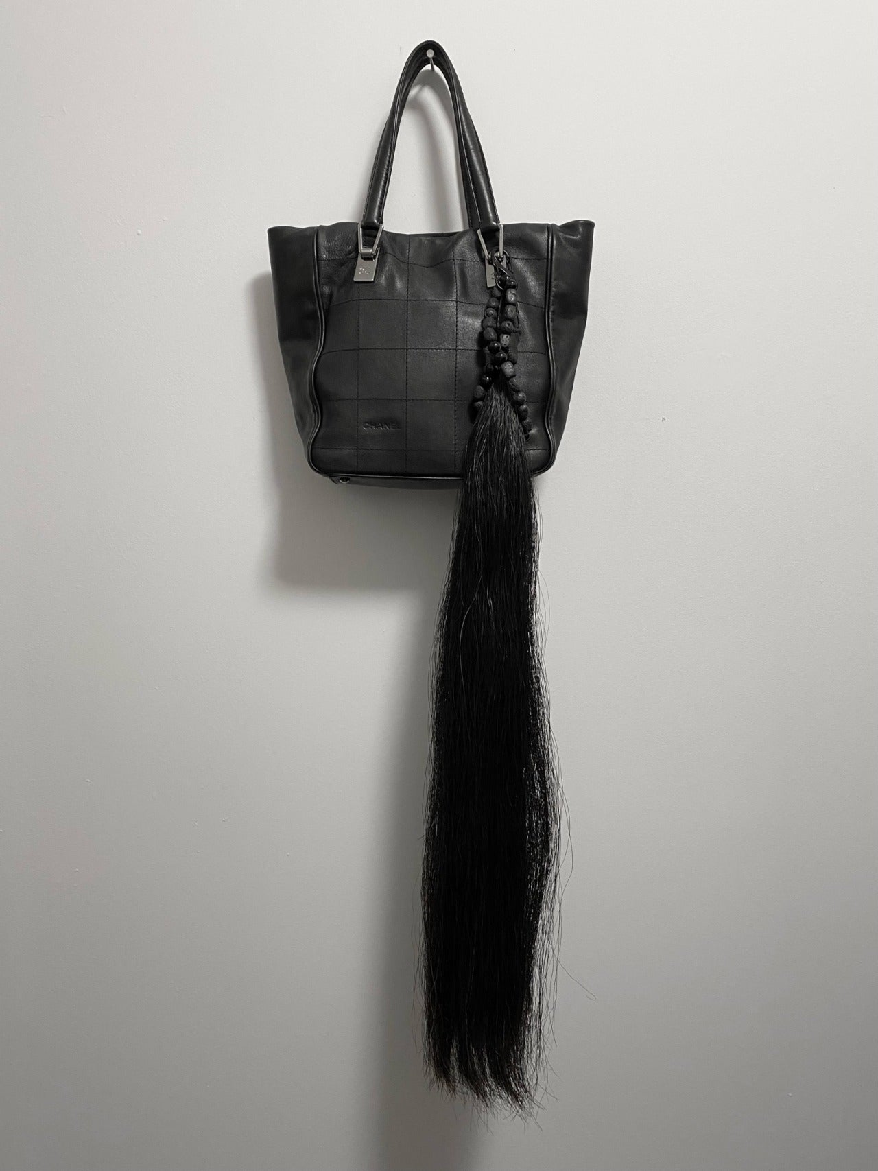 BLACK HORSE TAIL ADORNMENT
