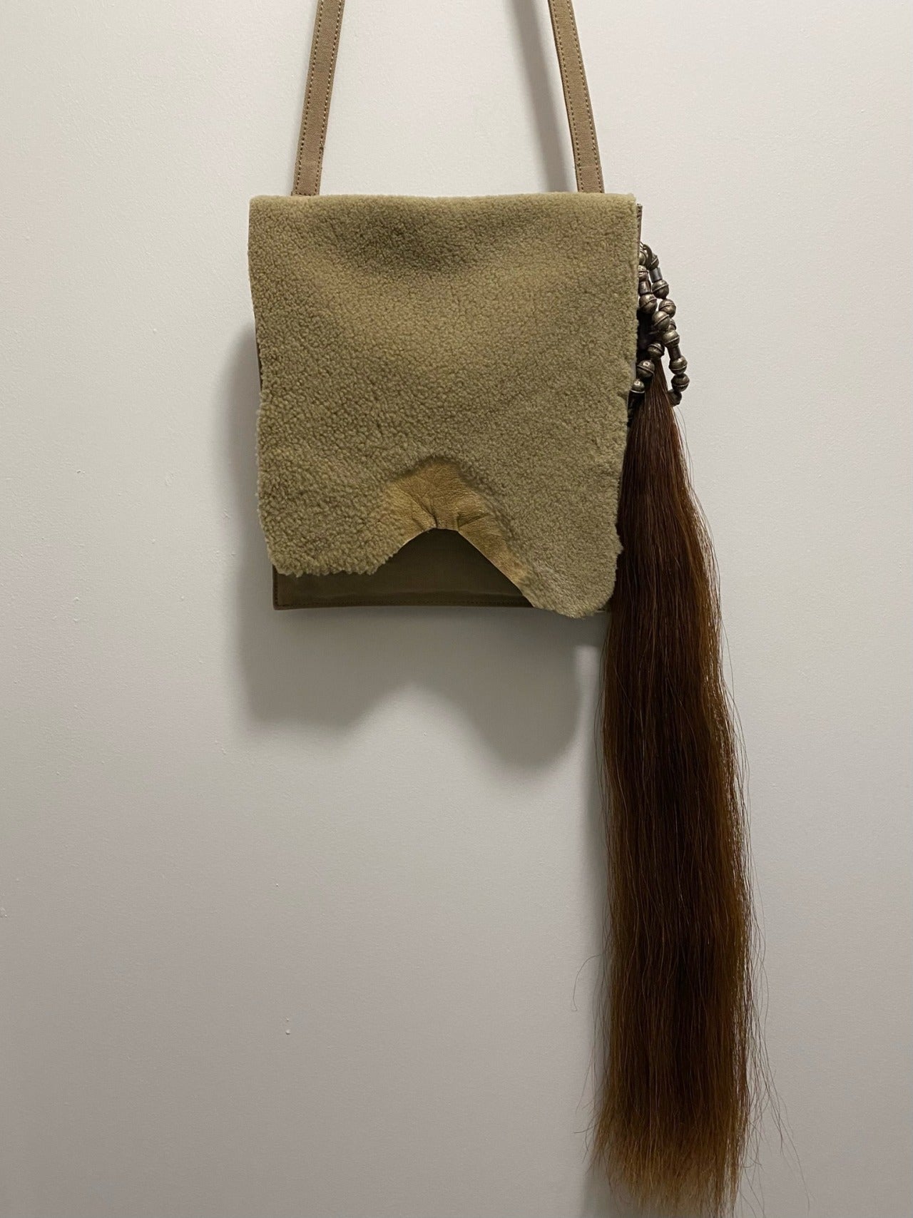 BROWN HORSE TAIL ADORNMENT