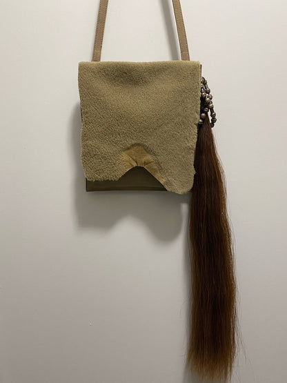 BROWN HORSE TAIL ADORNMENT